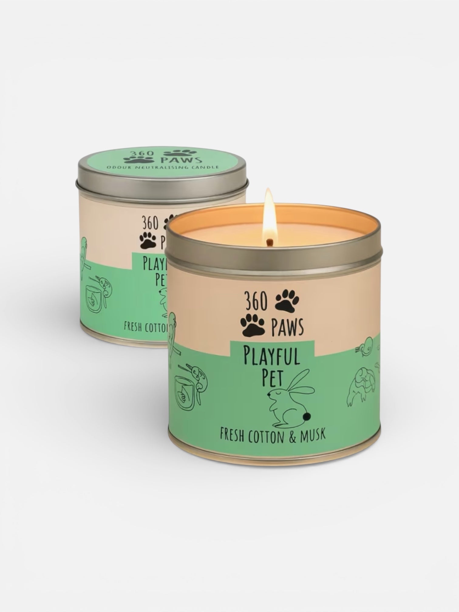 Candle in a '360 Paws' container with a lit wick on a white background