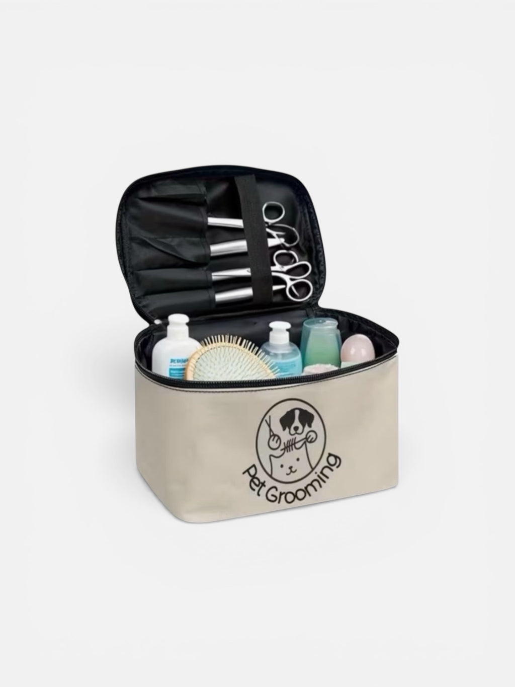 Pet grooming kit with tools and products in a beige bag on a white background