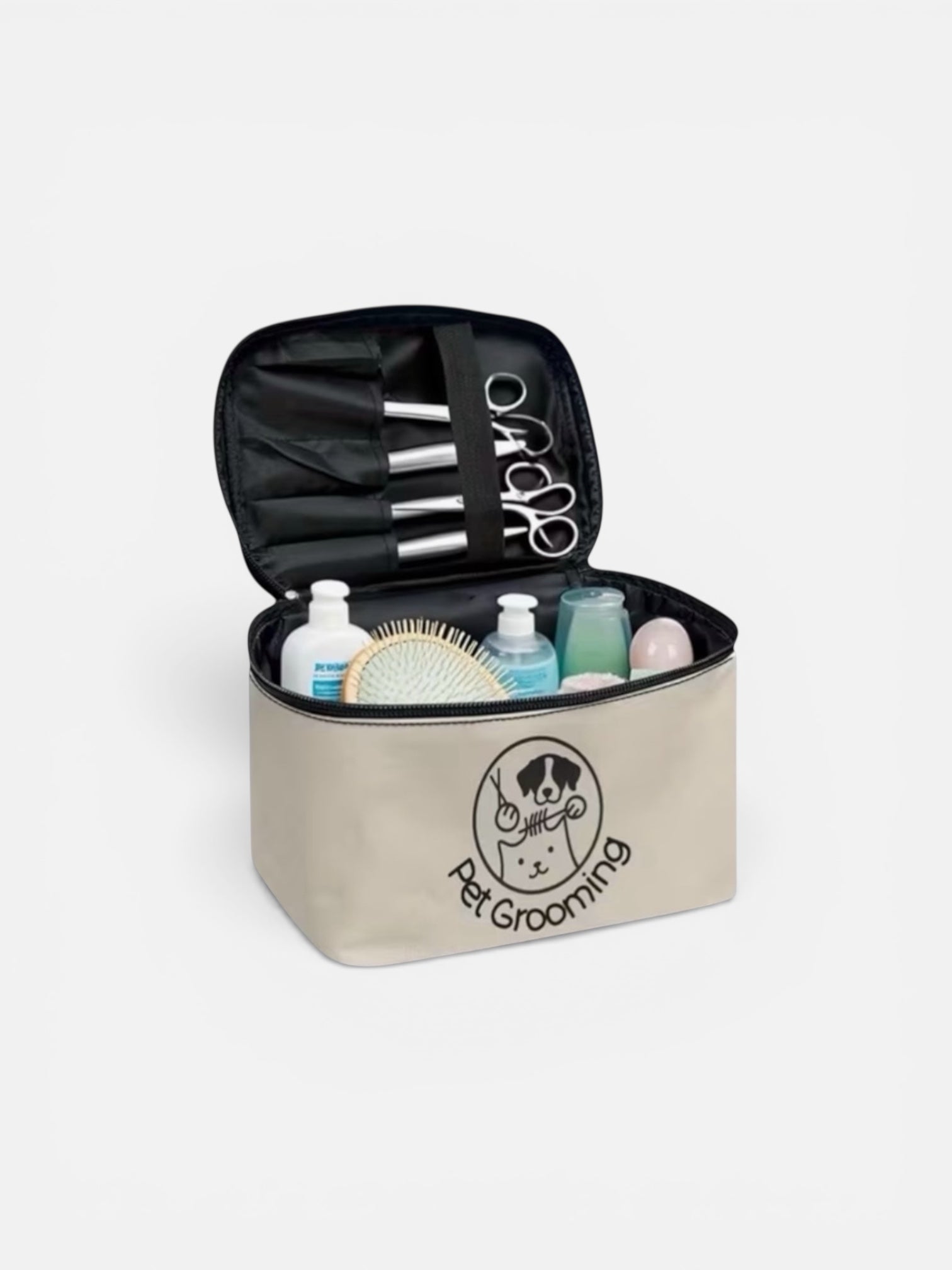 Pet grooming kit with tools and products in a beige bag on a white background