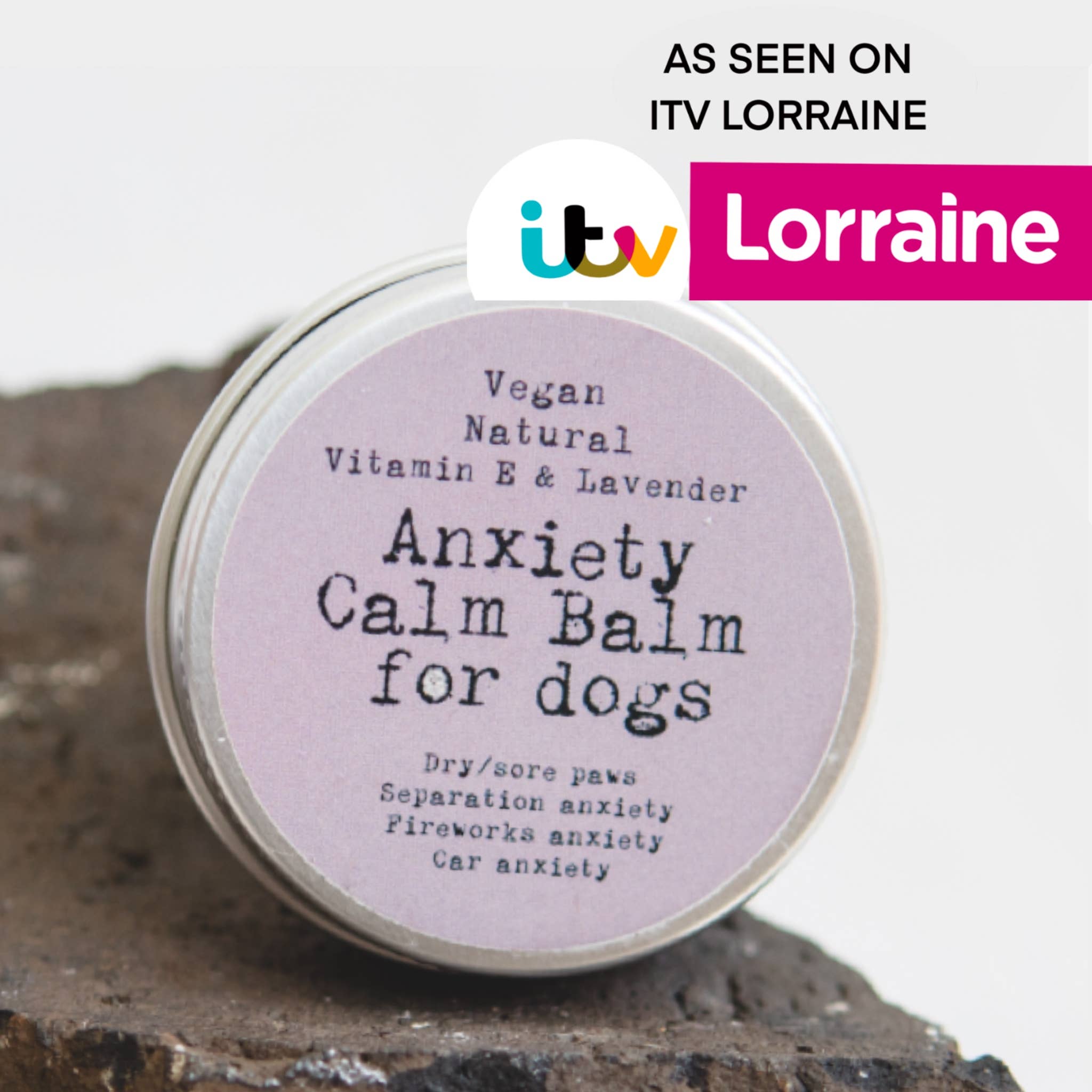 Vegan natural anxiety calm balm for dogs on a rock with ITV Lorraine branding.
